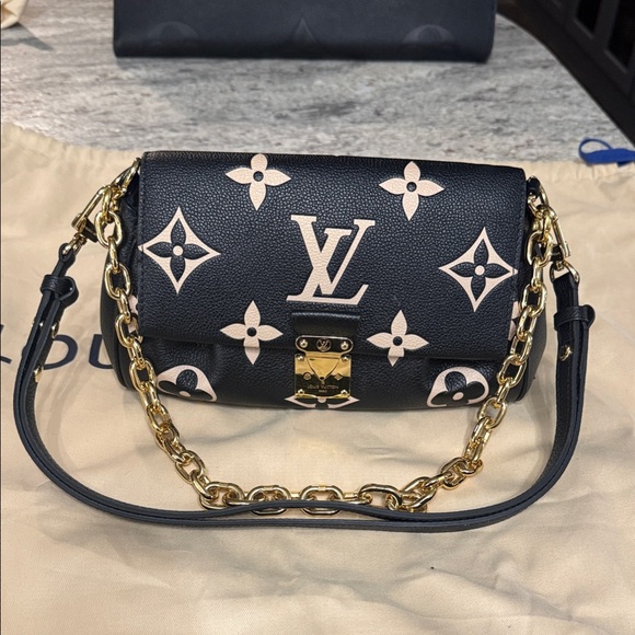 Louis Vuitton Handbags - Louis Vuitton Black and Cream Crossbody Bag with Gold Chain